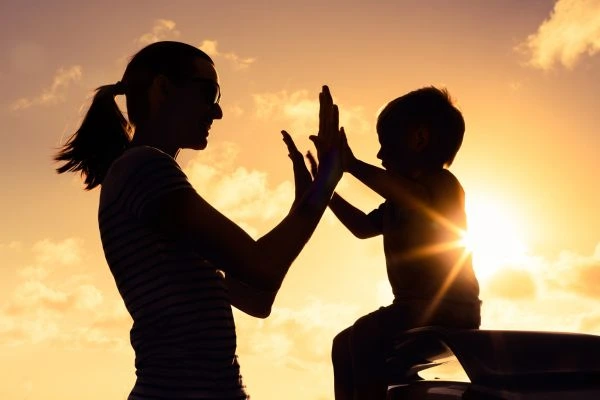 Image of happy mother and child after resolving child arrangements West Sussex